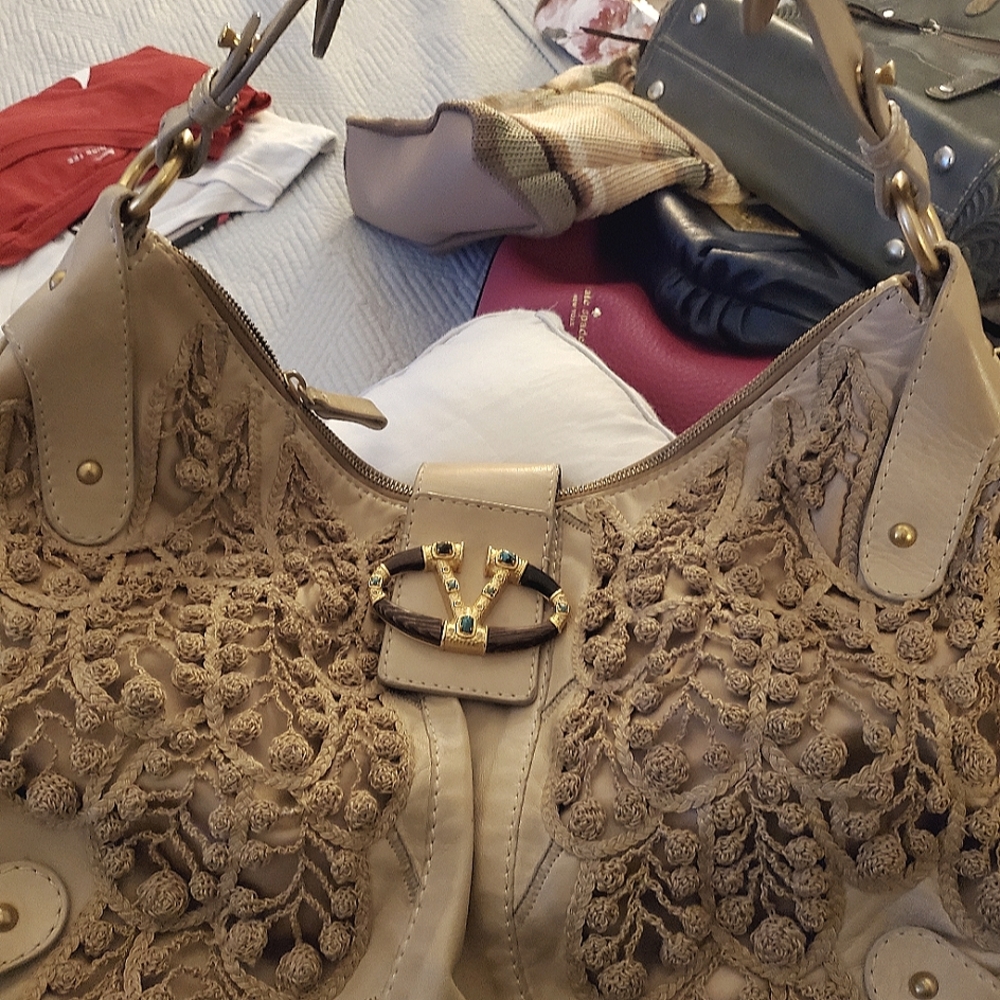 Valentino lace and leather handbag in beige.